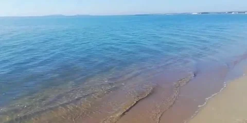 Long shot shore sandy beach Sardinia Stock Footage 159127986
