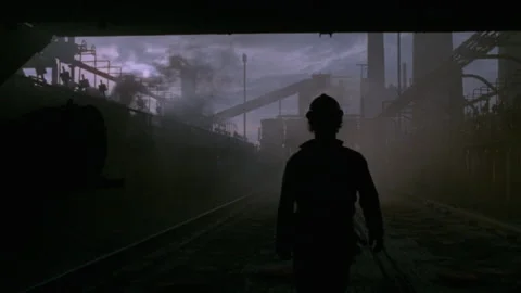 Long shot of a silhouetted man walking towards the camera through smoke Stock Footage 312273682
