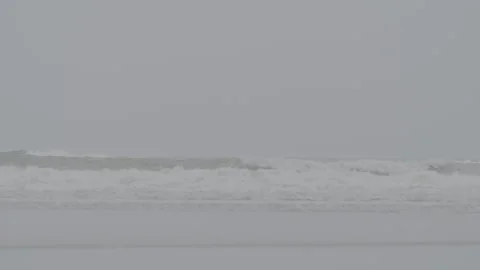 Long shot of slow motion waves Stock Footage 169649676