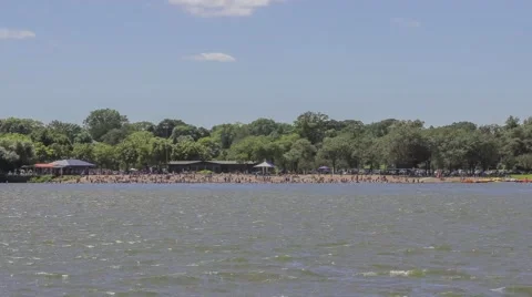 Long Shot of A Summertime Beach Scene Video stock 65321152