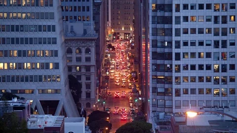 Long shot time lapse high angle view of traffic and pedestrians on a busy street Stock Footage 72547308