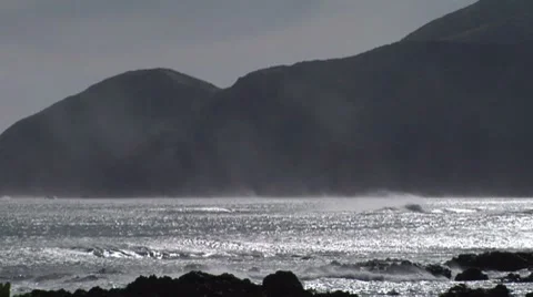 Long shot waves on a windy day Stock Footage 8680762