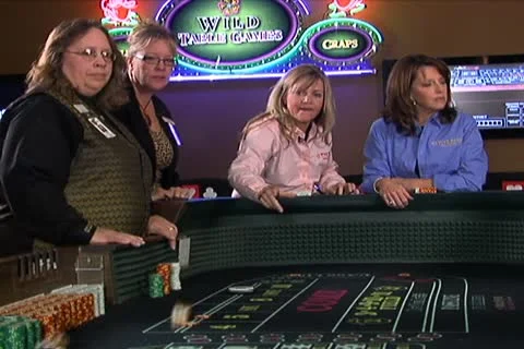 Long Shot of Woman Rolling Dice at Craps Table Stock Footage 10686389