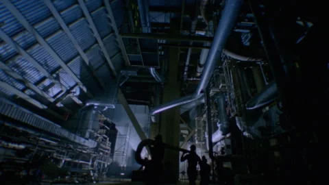 Long shot of workers inside a factory Stock Footage 312274147