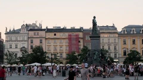 Long slow motion slide along Rynek Glowny, Main Square in Krakow Stock Footage 265161762
