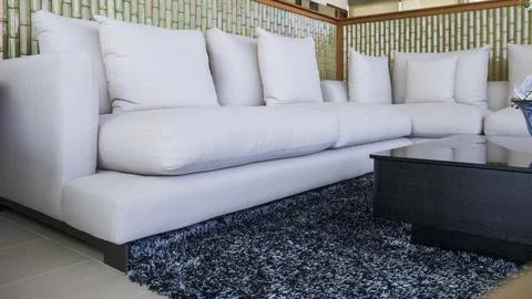 Long sofa in the living room. Stock-Illustration