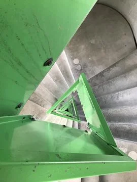 Long spiral staircase in triangular shape. Staircase of the observation tow.. 写真素材