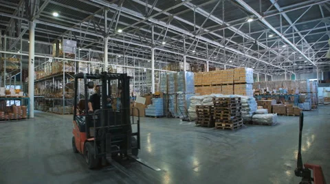 Long stack arrangement of goods in a wholesale and retail warehouse depot Stock Footage 67478613