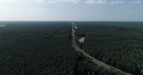 Long straight road for vehicle testing with forest Germany drone aerial 4k Stock Footage 124647515