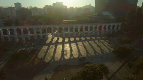 Long sunset shadows cast from the Carioca Aqueduct known as the iconic Lapa 스톡 동영상 126114480