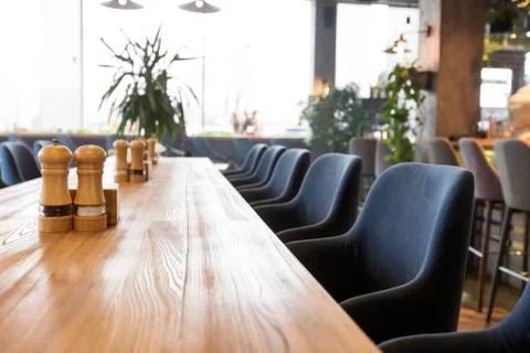 Long table in cafe for coworking, empty interior, no people 写真素材