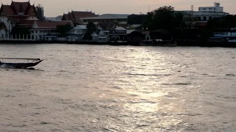 Long tail boat move along the river in the evening at Bangkok Thailand Stock Footage 68344083
