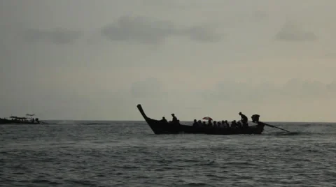 Long tail boat moving through the water in Thailand Stock Footage 62468242