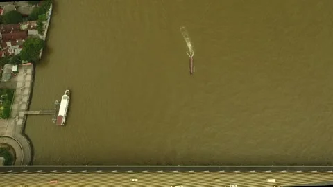 Long tail boat passing under bridge in Bangkok Stock Footage 262129001