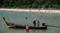 Long Tail Boat, People walking, swimming, snorkeling, Kata Beach in Thailand HD Footage