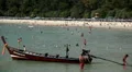 Long Tail Boat, People walking, swimming, snorkeling, Kata Beach in Thailand HD Footage