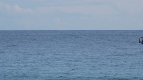 Long tail boat sailing in deep sea at day time Stock Footage 134188259