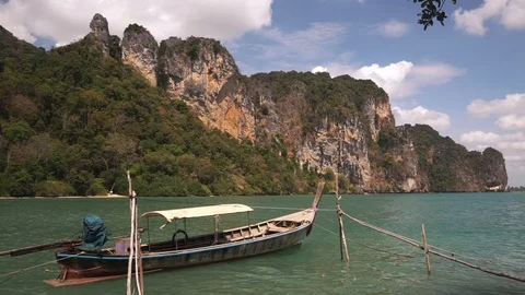 Long tail boat swing on calm waves of Andaman sea Stock Footage 109122769