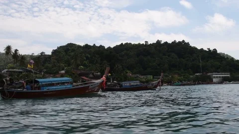 Long tail Boats 1/2 4K Stock Footage 80497133