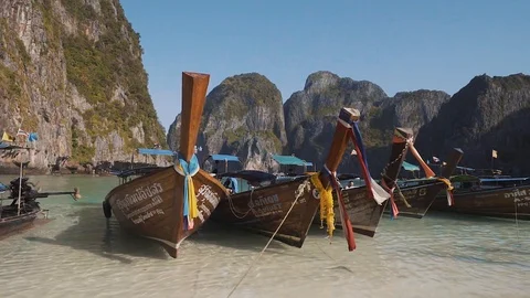 Long tail boats on phi phi islands maya bay slow motion 動画素材 94166813