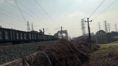 Long Take of Chinese Freight Train with Original Rail Sound Stock Footage 330594213