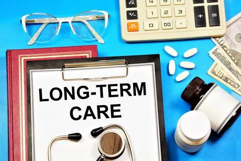 Long-term care. A text label in the planning folder. Stock Photos