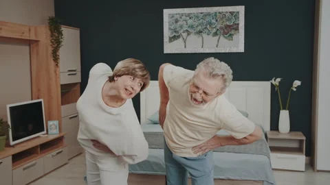 Long-Term Loving Couple Doing Yoga Together At Home, Vídeos de archivo 327459431
