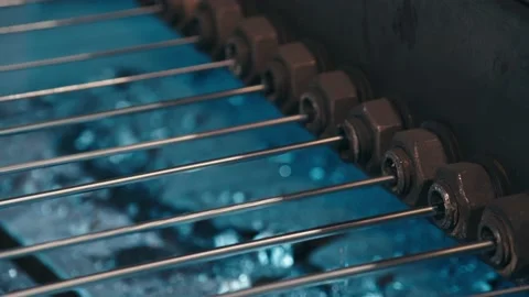Long thin metal goes through the production stage Stock-Footage 171112907