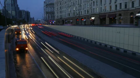 Long time exposure night scene of highway with long car lights trails Stock Footage 51532344