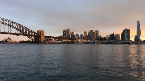 Long time lapse across Sydney harbour at sunset with city CBD waterfront – 4k. Stock Footage 139163368