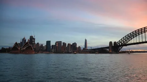 Long timelapse over Sydney harbour landmarks at sunset from red to dark. Stock Footage 134913702