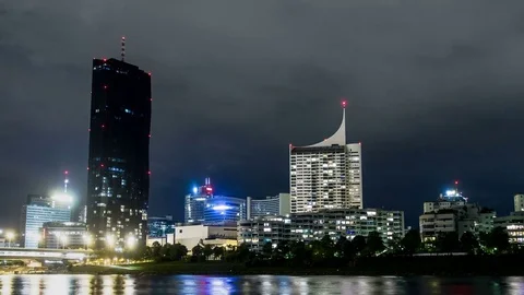 Long tracking shot at Vienna Donaucity DC tower night - Hyperlapse Stock Footage 74378613