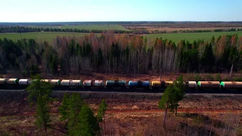 A long train with round train car wagons for gasoline and fuel. Stock Footage 196509002