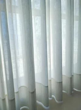Long, translucent white curtain Stock Photos