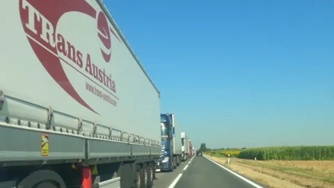 Long truck queue column on the road after a traffic accident Video stock 247905395