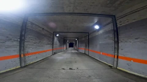 Long underpass walking Stock Footage 240974691