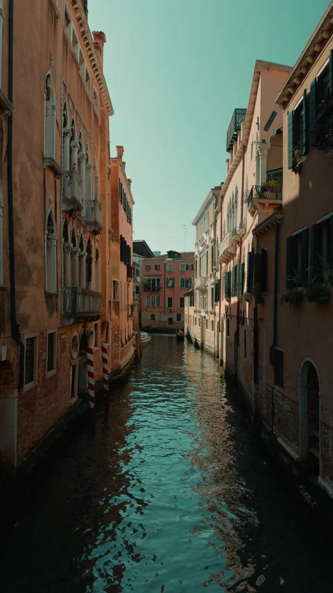 Long Venice canal perspective between weathered facades Stock Footage 336712162