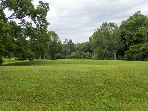 Long view of curving Serpent Mound Prehistoric Earthworks in Ohio Stock Photos
