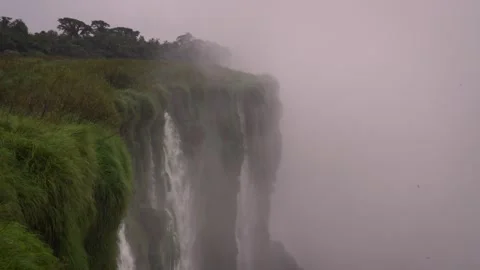 Long View of Devil's Throat Shrouded in Mist at Iguazu Falls Stock Footage 341555623