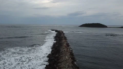 Long walking path at the beach with big waves - Drone/Aerial shots Stock Footage 144224115