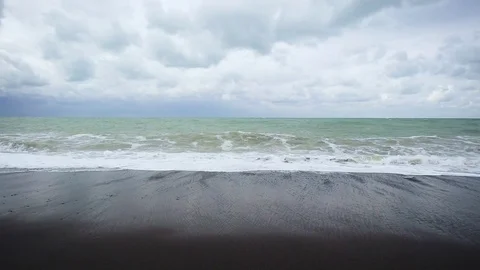 The long wave rolls to the shore slow mo Stock-Footage 82124147