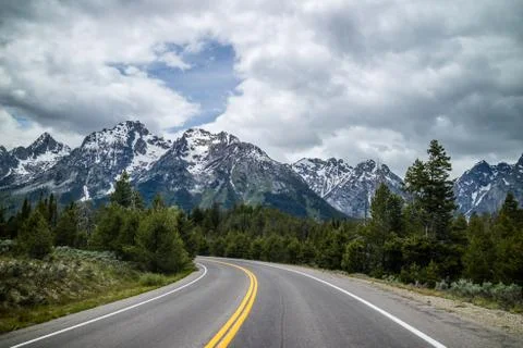 A long way down the road going to Grand Tetons NP, Wyoming Stock Photos
