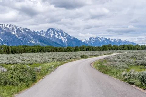 A long way down the road going to Grand Tetons NP, Wyoming Stock Photos