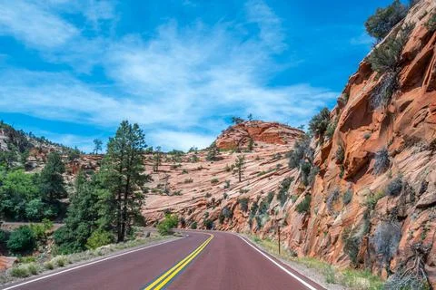A long way down the road going to Zion National Park, Utah Stock Photos