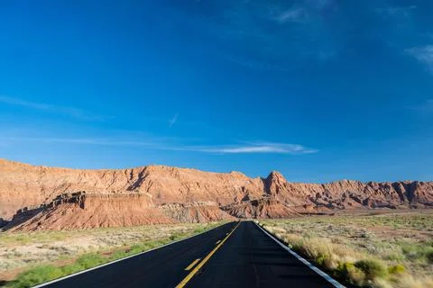 A long way down the road going to Glen Canyon National Recreation Area, Arizona Stock Photos