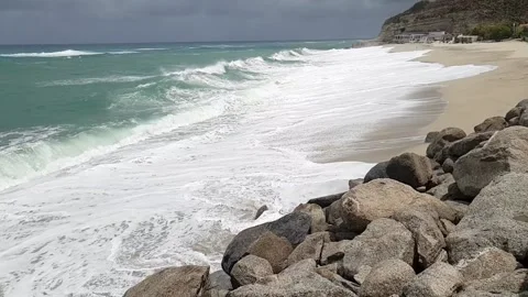 Long white Sand beach with big waves - Slow motion Stock Footage 133464760