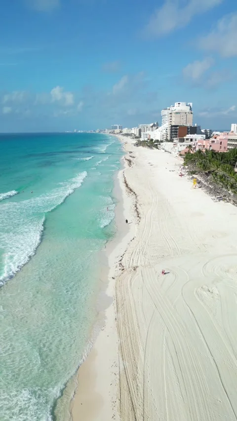 Long white sand beach of Cancun seen from a drone on a sunny day Stock Footage 342090305