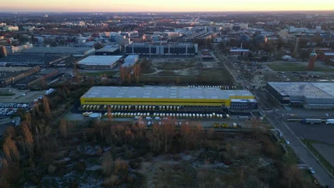 Long yellow DHL distribution center Berlin. Gorgeous aerial view flight drone Stock Footage 321819814