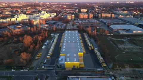 Long yellow DHL distribution center Berlin. Magic aerial view flight drone Stock Footage 321820927