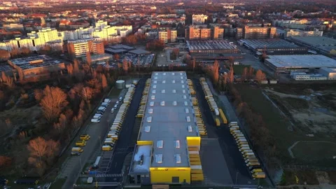 Long yellow DHL distribution center Berlin. Best aerial view flight drone Stock Footage 321821319